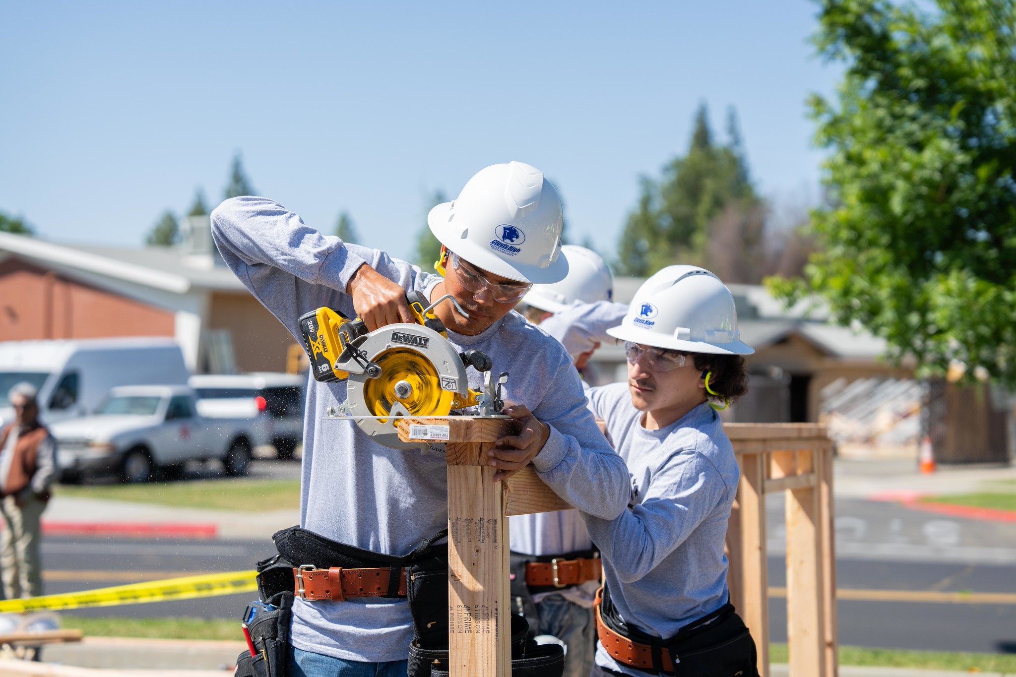 Two students building a structure as part of the Career Skills Competition.